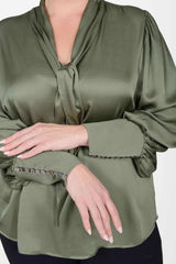 Mayes NYC Mia Scarf Neck Blouse in Solid color Olive worn by model Max