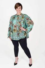 Mayes NYC Rosen Tie Neck Ruched Shoulder Blouse in Boho Scarf Print in Aqua color worn by model Max