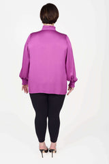 Mayes NYC Torie Blouse in Solid Berry color worn by model Max