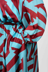 Mayes NYC Edwina Midi Off Shoulder Dress in Blue and Red Circle Stripes worn by model Megan Smith