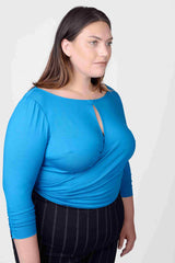 Mayes NYC Tamara Keyhole Wrap Top In Blue worn by model Megan Smith