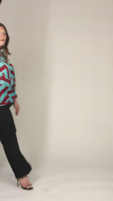Mayes NYC Rosen Tie Neck Ruched Shoulder Blouse in Blue and Red Circle Stripes worn by model Megan Smith