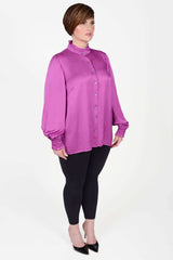 Mayes NYC Torie Blouse in Solid Berry color worn by model Max
