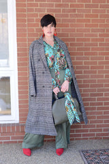Mayes NYC Rosen Tie Neck Ruched Shoulder Blouse in Boho Scarf Print in Aqua color worn by model Max