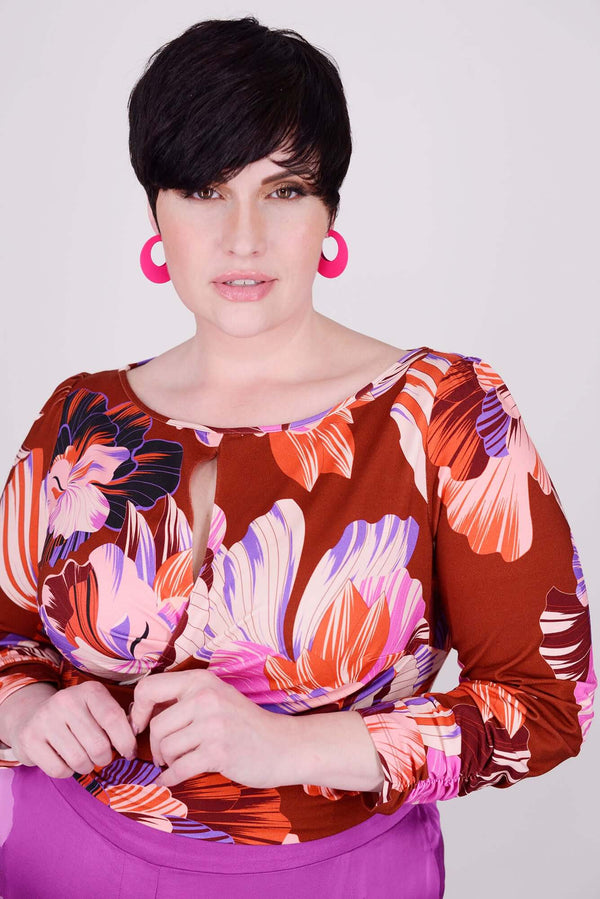 Mayes NYC Tamara Keyhole Wrap Top   in Flower Fan Print with a Terracotta based color worn by model Max