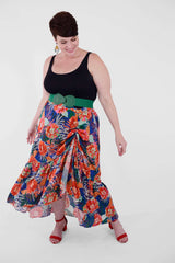 Mayes NYC Erin Rushed Slit Skirt ion Tahiti Tropical flower Print with Cobalt based color worn by model Max
