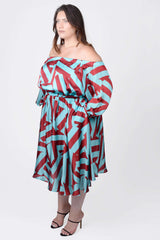 Mayes NYC Edwina Midi Off Shoulder Dress in Blue and Red Circle Stripes worn by model Megan Smith