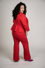 Mayes NYC Carter 70’s Flared Trouser in red worn by model Grace Delgado